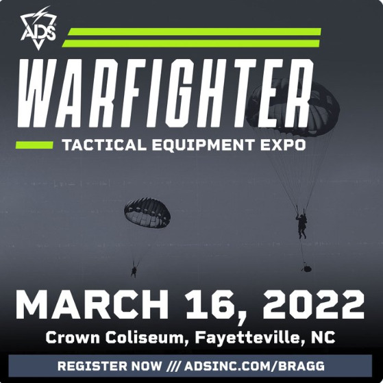 This image is a black and white depiction of two parachutists descending from the sky. They are attached to a black parachute with white lines. The background is a clear sky. There is a green and white banner that reads ‘Warfighter Tactical Equipment Expo March 16, 2022 Crown Coliseum, Fayetteville, NC’. The banner has the ADS logo on the top left corner.