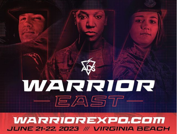 This is a poster for the Warrior East Expo 2023, a military and defense industry trade show. The poster has a dark background with red and white text. The text reads ‘WARRIOR EAST’ and ‘WARRIOREXPO.COM JUNE 21-22, 2023 // VIRGINIA BEACH’. The ADS logo is also present on the poster. There are three red rectangles covering the faces of people in the background.